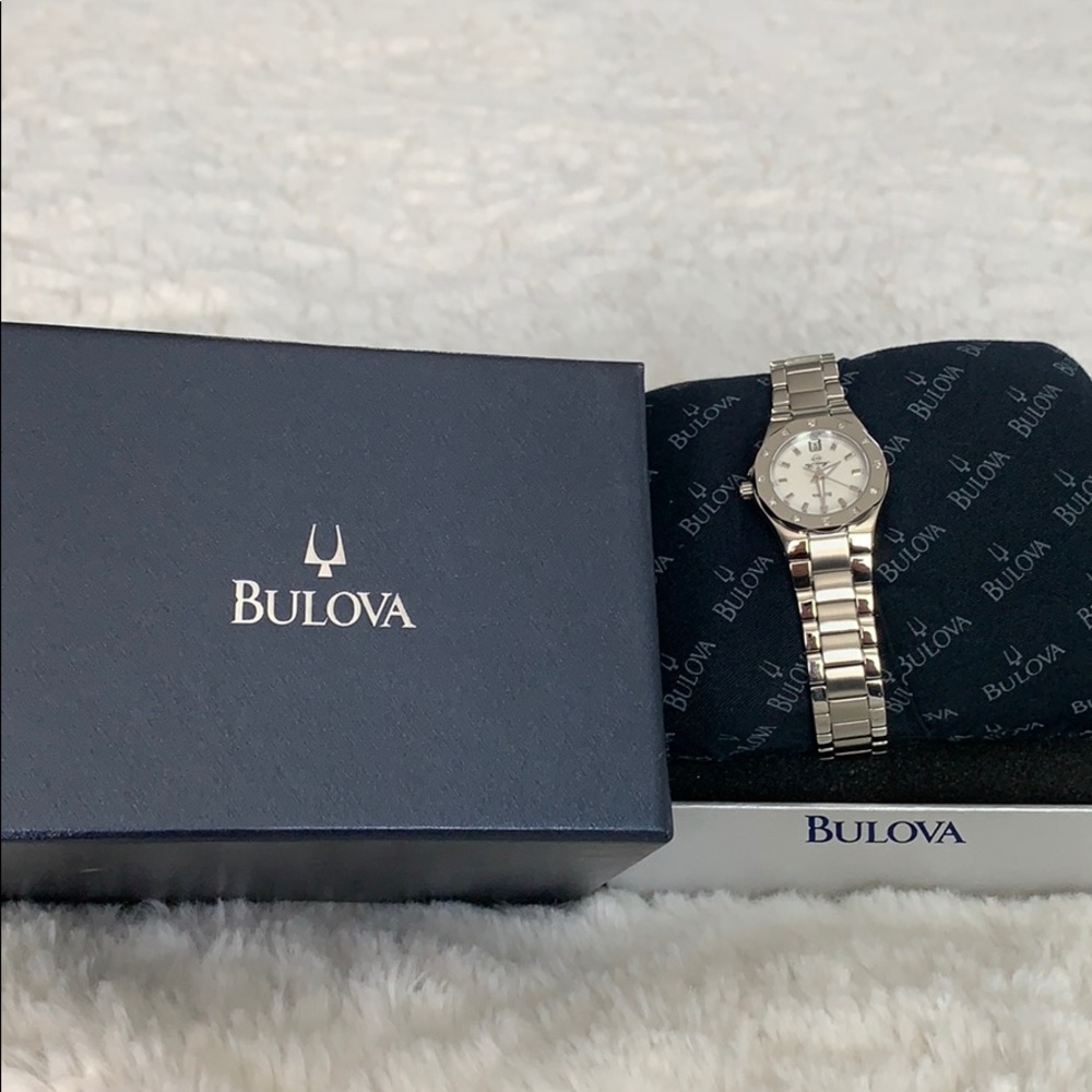 Bulova woman’s watch with 12 diamonds